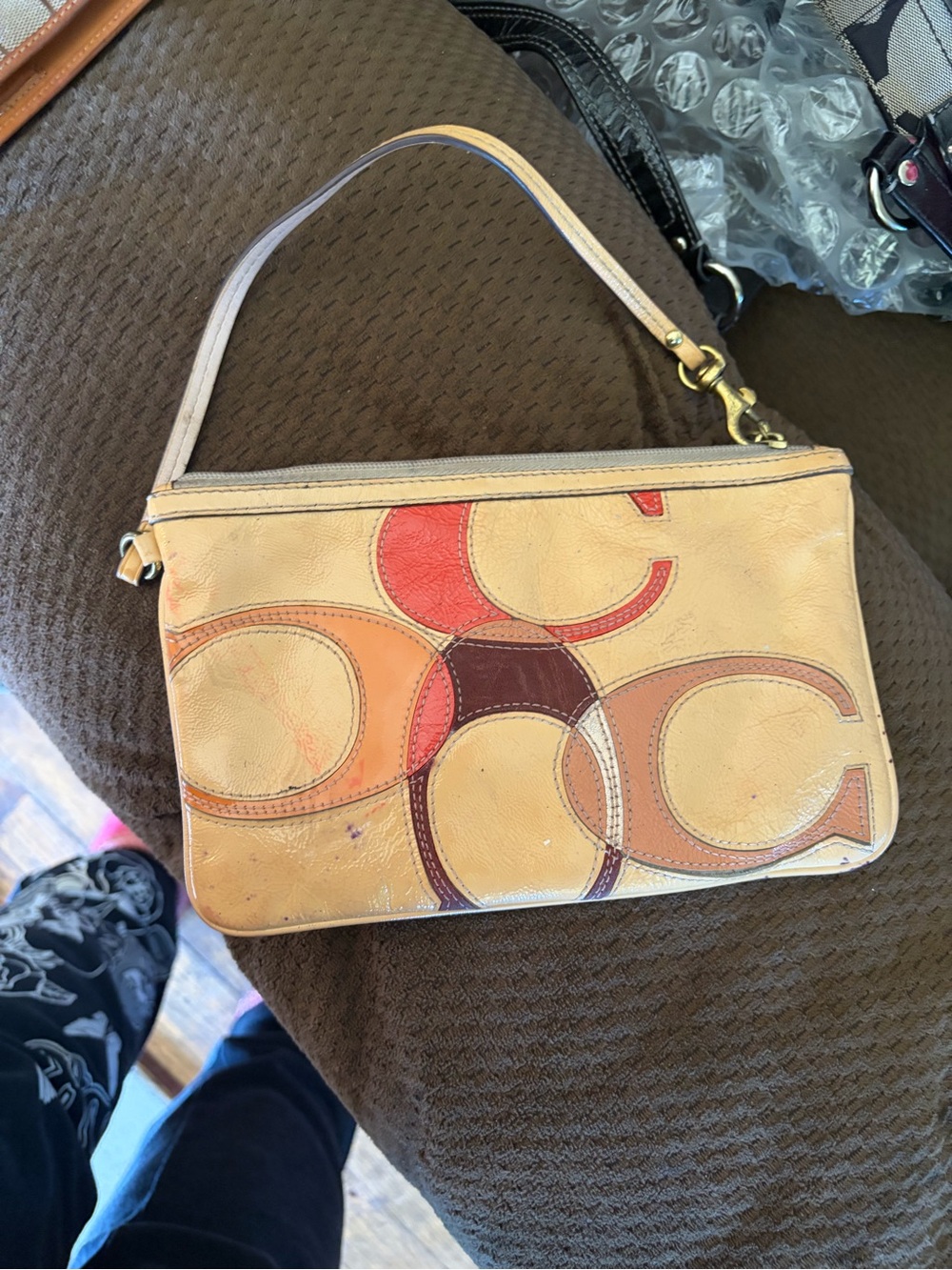 Coach Cream Leather Wristlet with Multicolor 'C' Appliqué